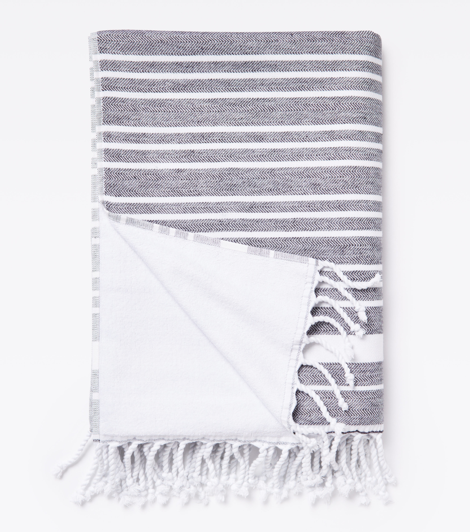 Averylily Swim, Surf + Sand Fouta Cotton Beach Towel in Basalt.