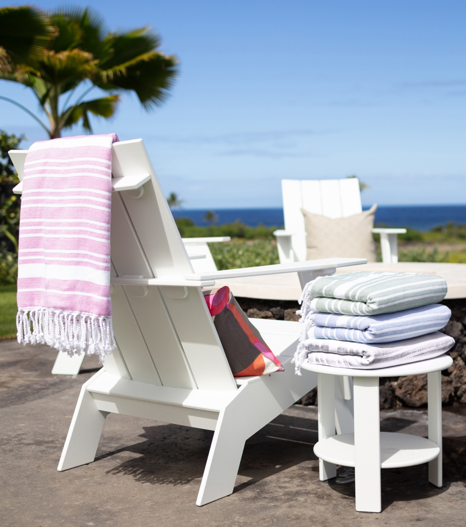 Averylily Swim, Surf + Sand Fouta Beach Towels in Ocean Blue, Orchid Pink, and Palm Green.
