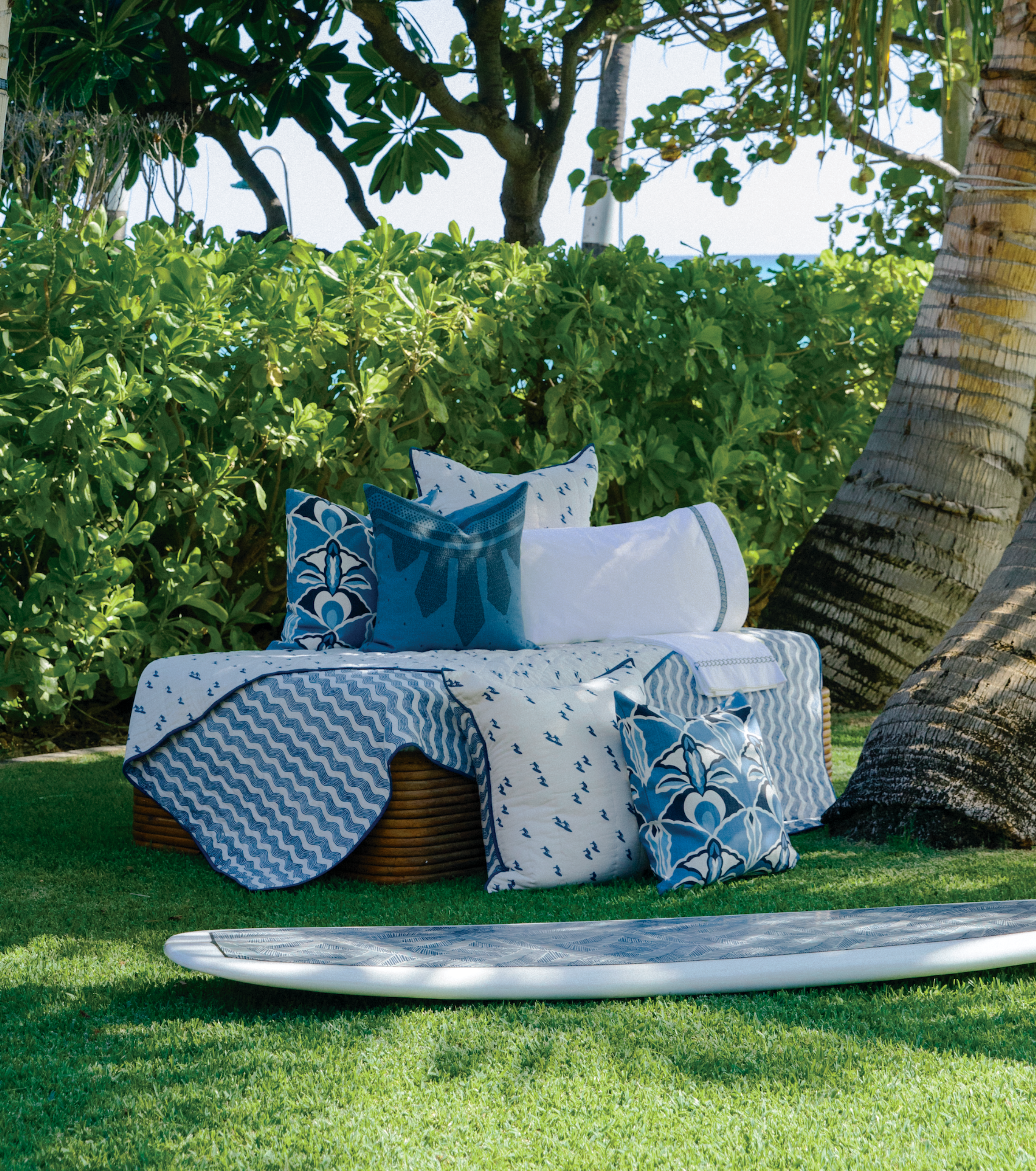 Andrew Mau x Averylily Surfer Blockprint Quilt and Euro Shams in Ocean Blue, styled with Serena Dugan Studio pillows.