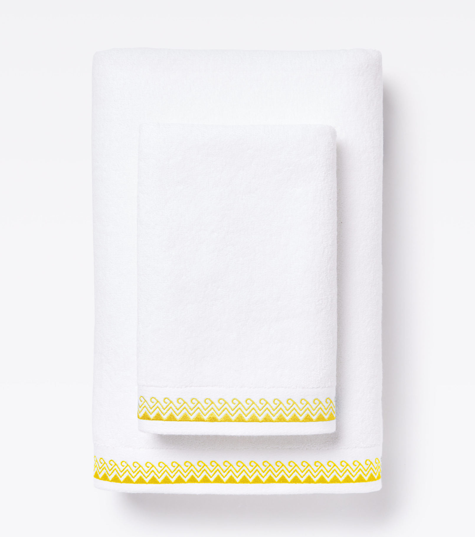 Averylily Wind + Wave Bath and Hand Towels in White with Yellow Sun trim, made from 600-gram weight pure Aegean cotton.