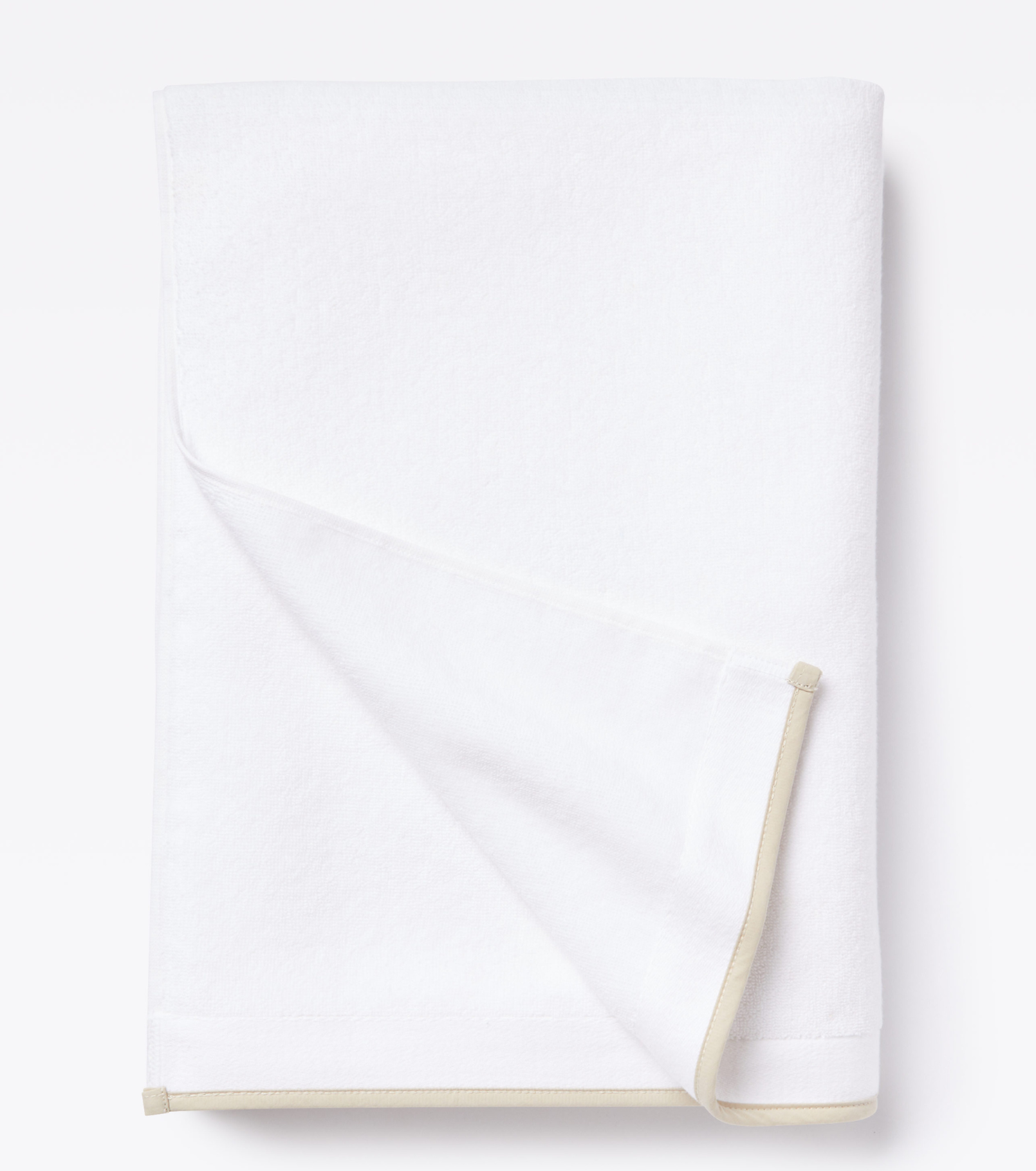 Averylily Border Bath Sheet in White with Sand trim, made from 600-gram weight pure Aegean cotton.