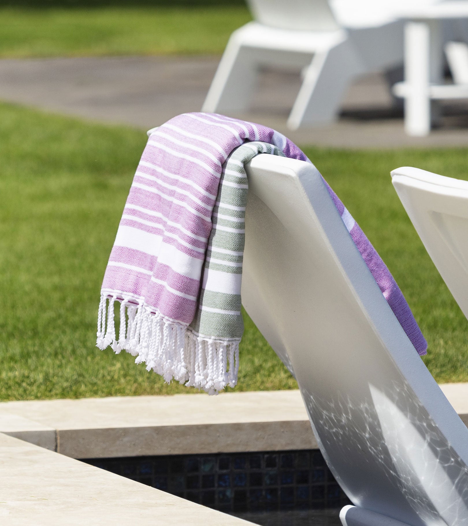 Averylily Swim, Surf + Sand Fouta Beach Towels in Orchid Pink and Palm Green.