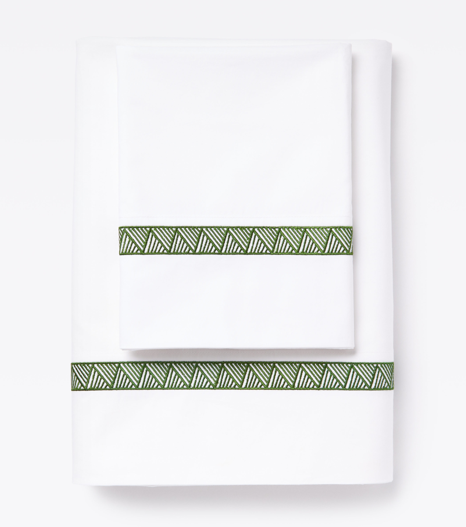 Averylily Weave Sheet Set in White with embroidered trim in Palm Green. 510-thread count pure cotton percale.