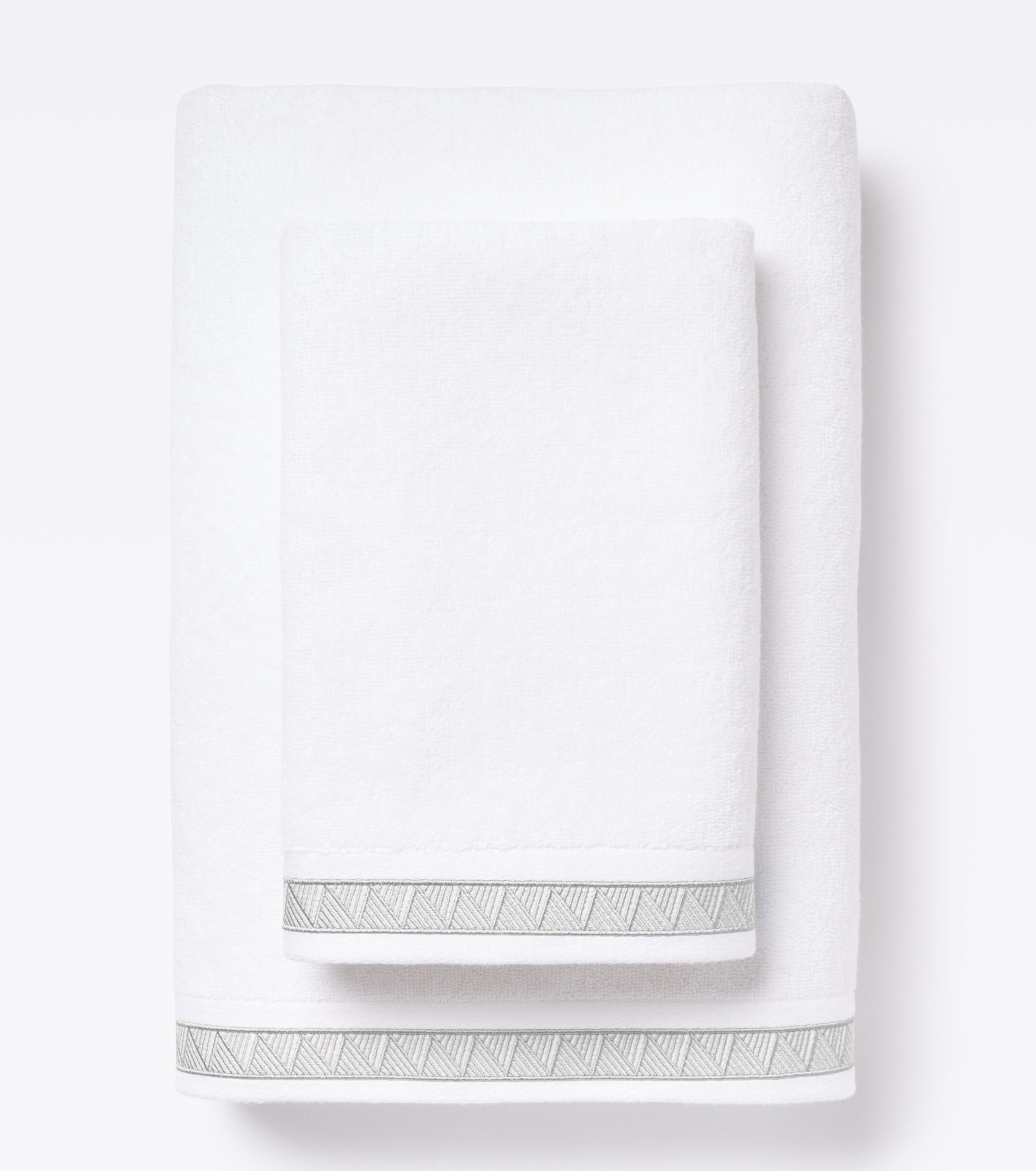 Averylily Weave Hand and Bath Towels in White with Stone Grey trim, made from 600-gram weight pure Aegean cotton. 